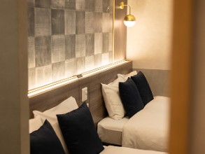 写真：全室サータ®製ベッドを導入